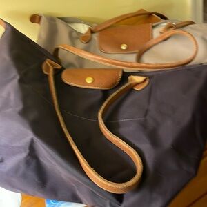 2 Longchamp Large Le Pilage - with damage at corners- $25 Deep purple and putty